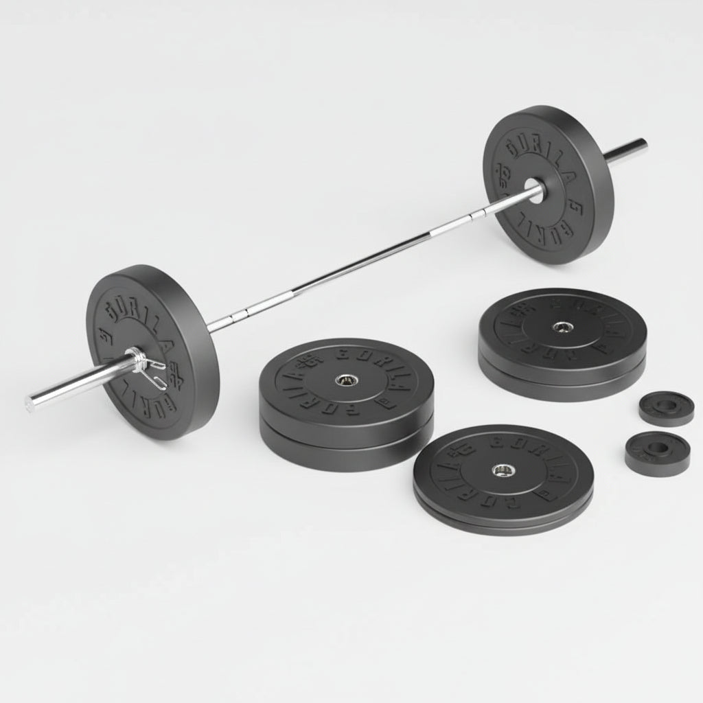 Gorila Fitness Olympic barbell loaded with plates, showing with precision knurling and needle bearings on a white floor