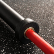 Close-up of the Gorila Bee Bearing Bar Teflon’s bushing with knurling detail, showcasing its grip and build quality for weightlifting and group fitness.