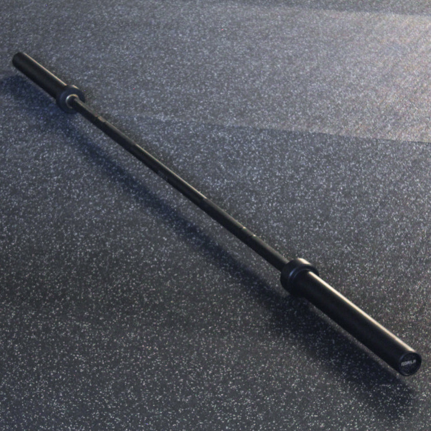 Angled full-length view of the Gorila Bar in Teflon Black, featuring its premium barbell construction and stealthy black-on-black finish, perfect for powerlifting, Olympic lifting, and CrossFit.