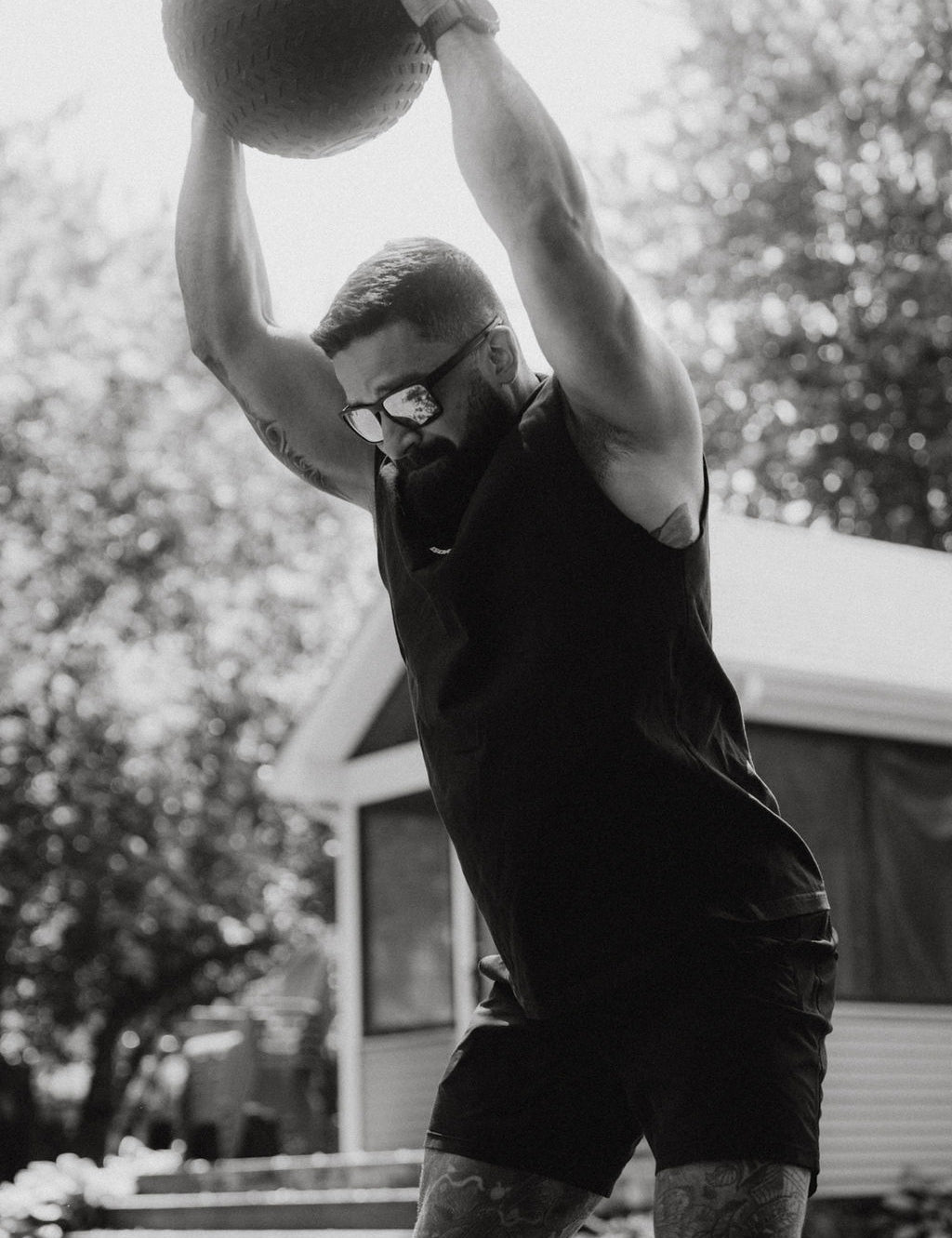 Athlete performing HIIT, powerful overhead slams with the Gorila Fat Slam Ball
