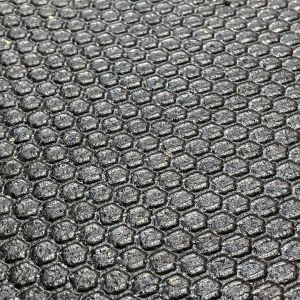 Rubber Flooring Mats Close-up on the top part and Bee Hive Texture.