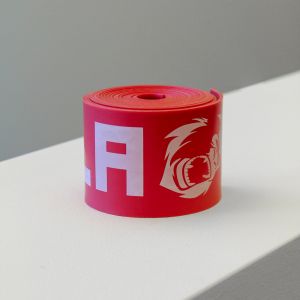 Rolled up Red Gorila Floss Band Cobra Band product page picture on white background. 